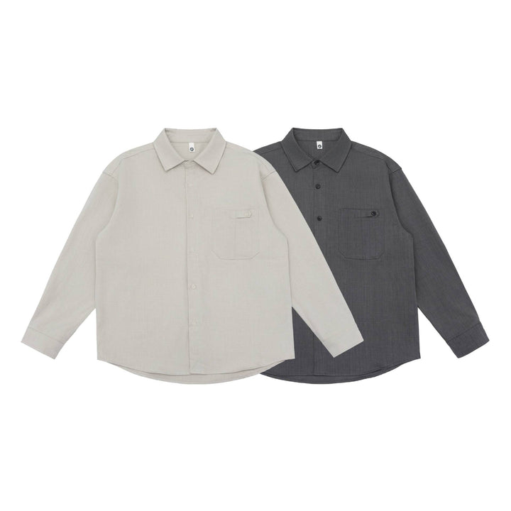 Unisex Oversize Hemdjacke im minimalistischen Workwear Stil mit gerundetem Saum und Brustpattentasche Echoarchiv