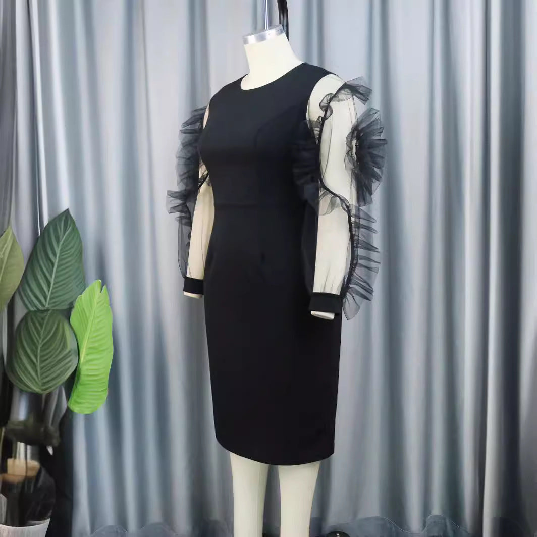 Damen Elegantes Figurbetontes Kleid mit voluminösen Tüllärmeln Echo Archiv
