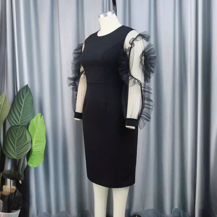 Damen Elegantes Figurbetontes Kleid mit voluminösen Tüllärmeln Echo Archiv