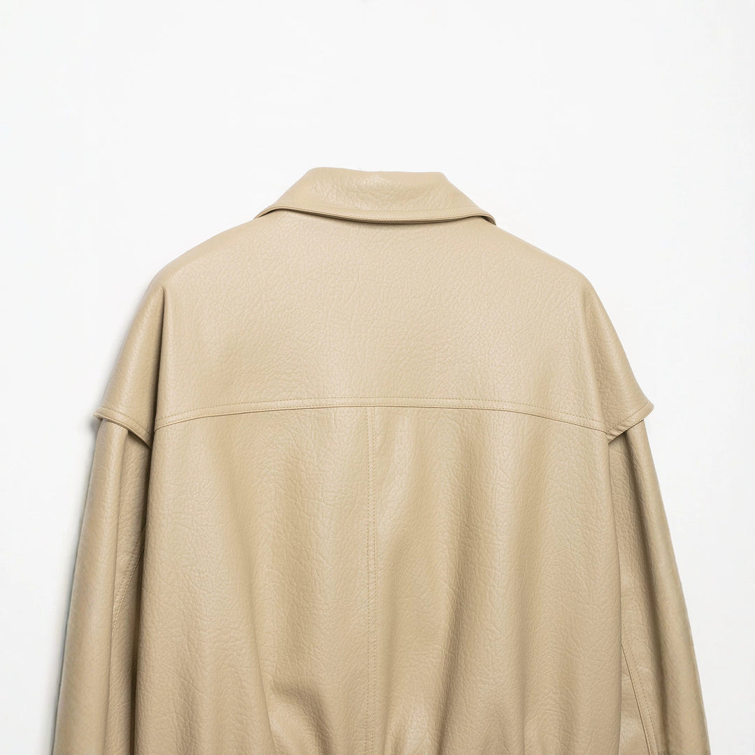 Damen Kurzjacke aus Kunstleder mit breitem Revers und gerafftem Saum Echo Archiv