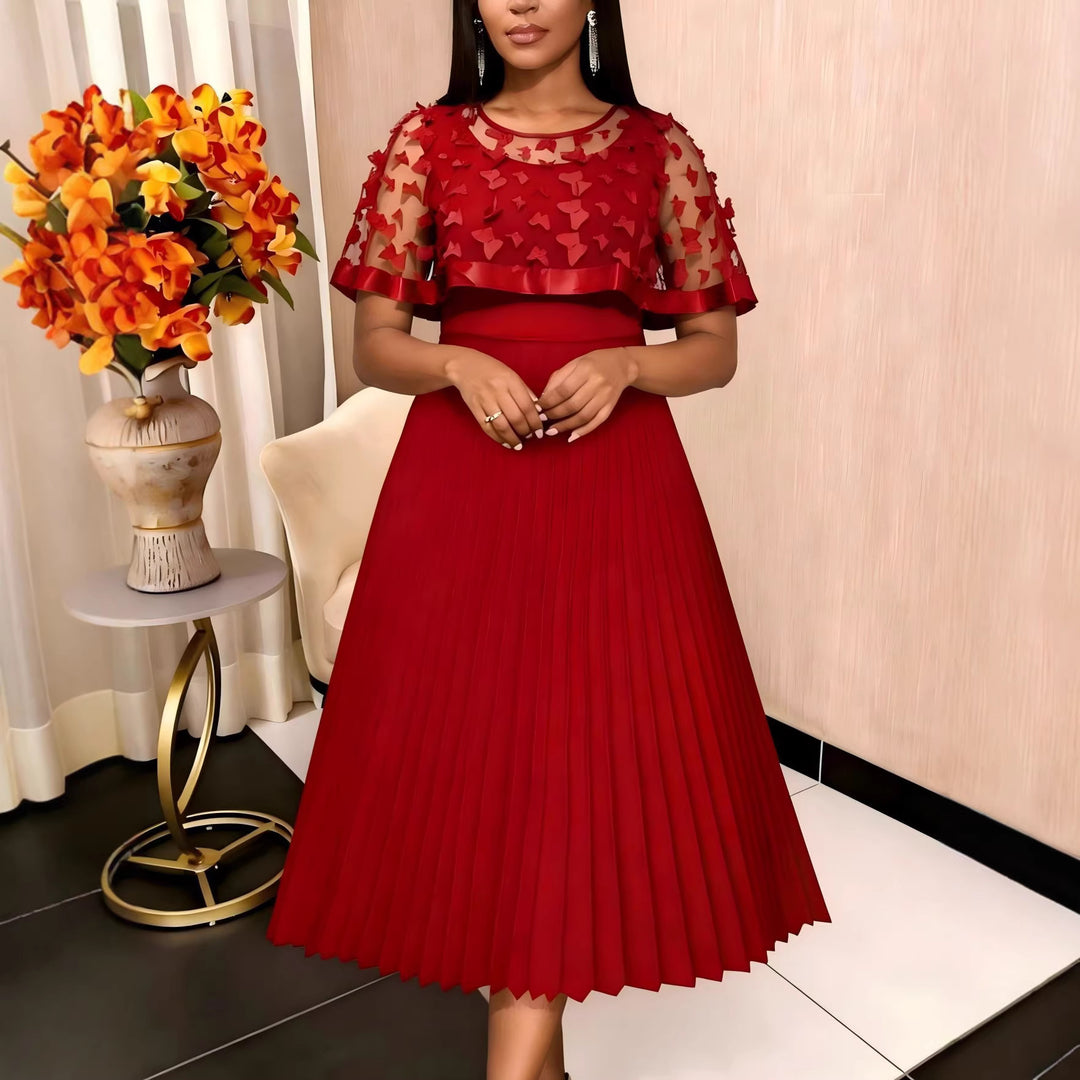 Damen elegantes Abendkleid mit plissiertem Rock und transparenten Puffärmeln Echo Archiv