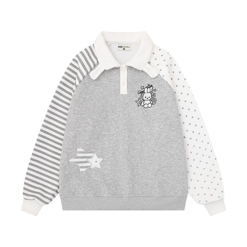 Damen Langarm-Polo-Sweatshirt im Patchwork-Stil mit kontrastierenden Ärmeln und Stern-Applikationen Echoarchiv