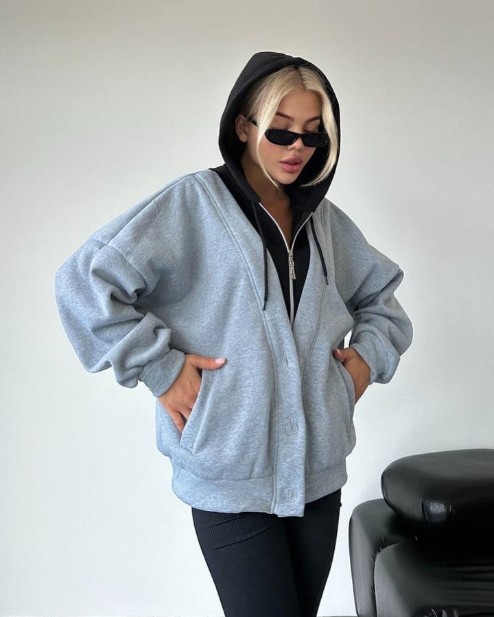 Damen Oversized Kapuzenjacke mit Druckknopfverschluss und Eingrifftaschen Echoarchiv