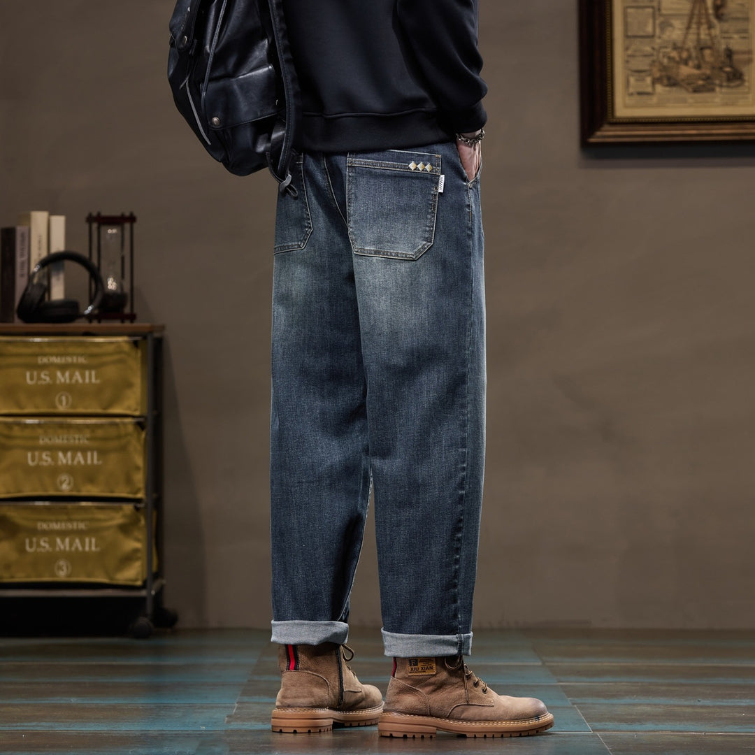 Herren Weite gerade geschnittene Denim-Jeans mit Used‑Wash und Umschlagbund Echoarchiv