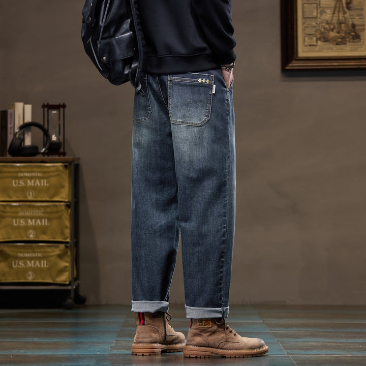 Herren Weite gerade geschnittene Denim-Jeans mit Used‑Wash und Umschlagbund Echoarchiv