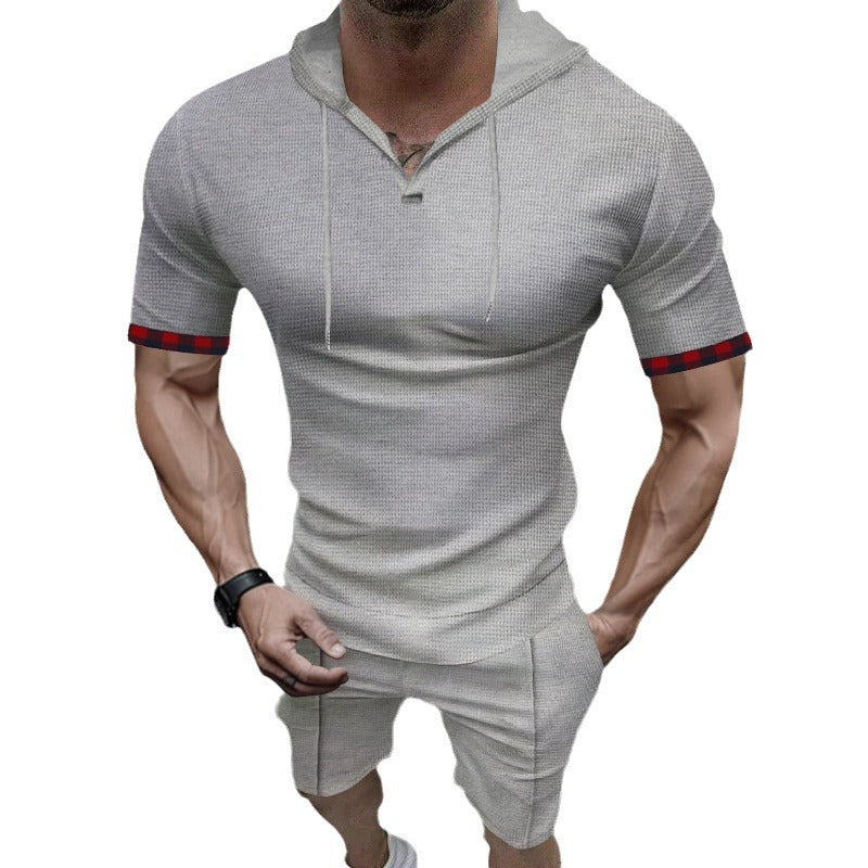 Herren sportliches Kurzarm-Hemden- und Shorts-Set mit Kapuze und kontrastierenden Ärmelabschlüssen Echoarchiv