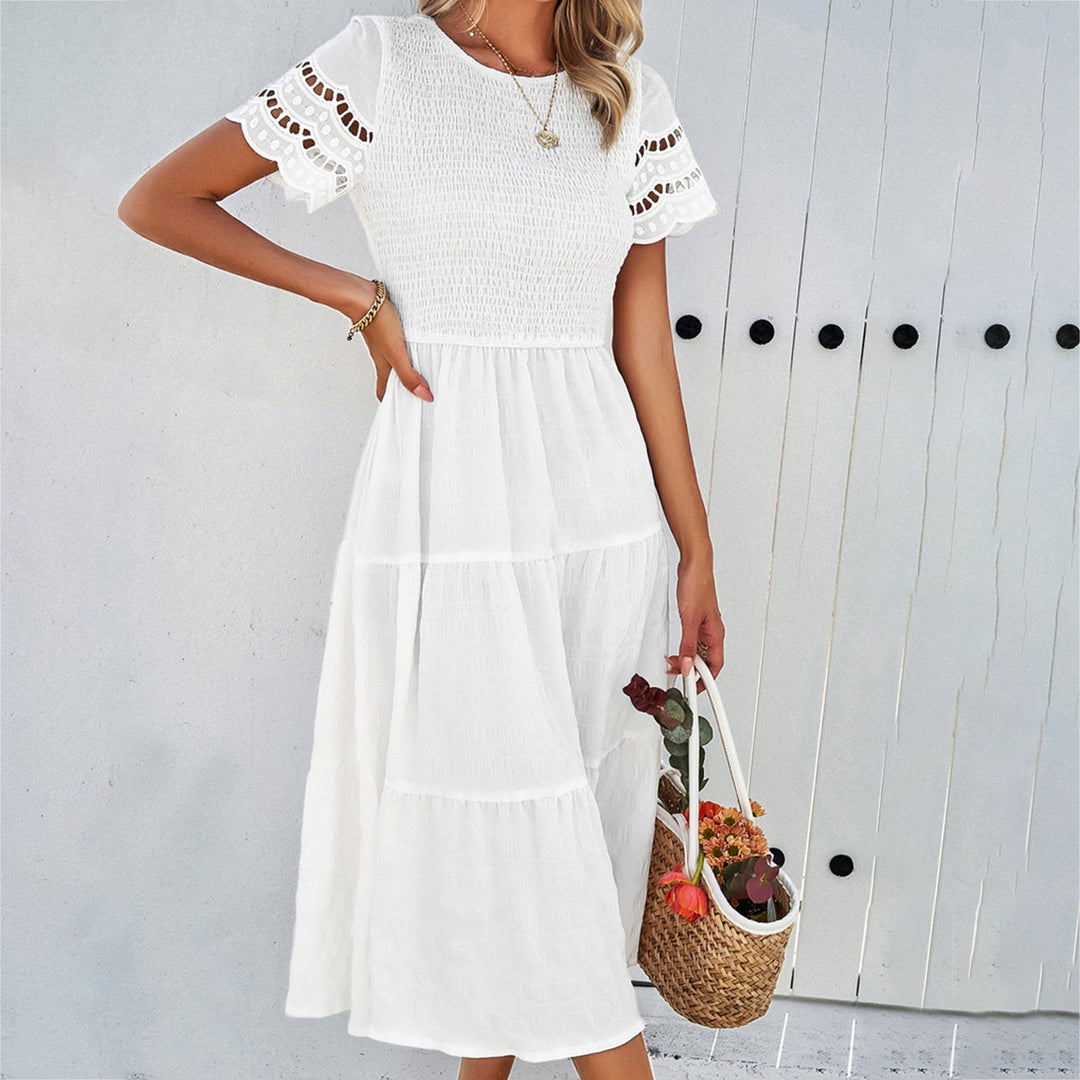 Damen Midikleid mit Puffärmeln und Elastischem Oberteil Echoarchiv