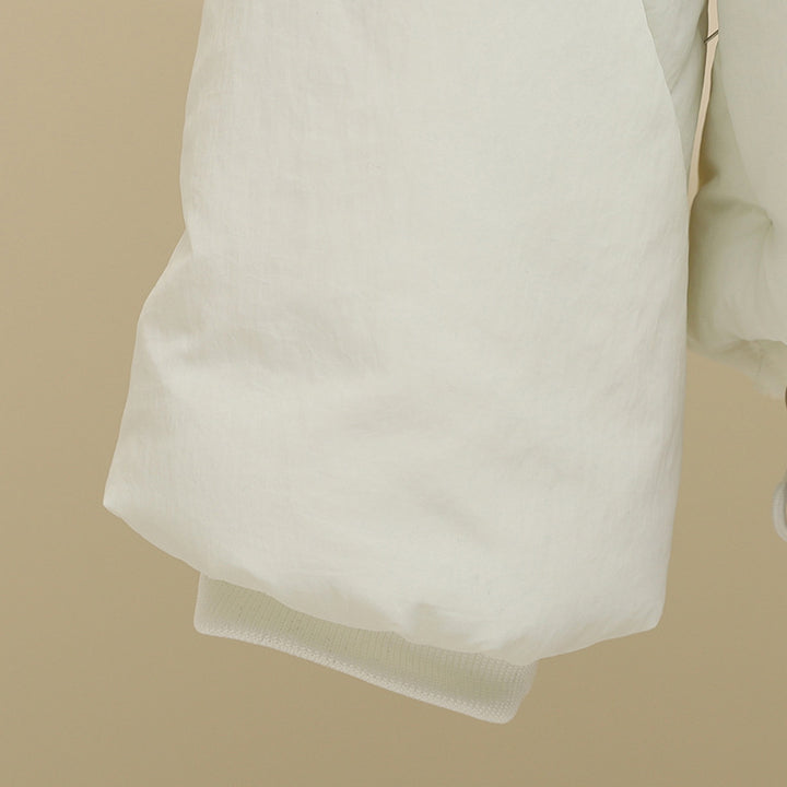 Damen gesteppte Kapuzenjacke mit kurzem Boxy‑Schnitt, verstellbarem Saum und wärmender Wattierung – Célinea