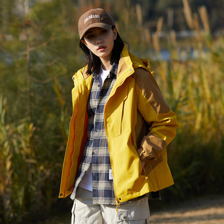 Damen zweilagige wasserabweisende Outdoorjacke mit Kapuze, Taillenregulierung und Kontrastbesätzen Echoarchiv