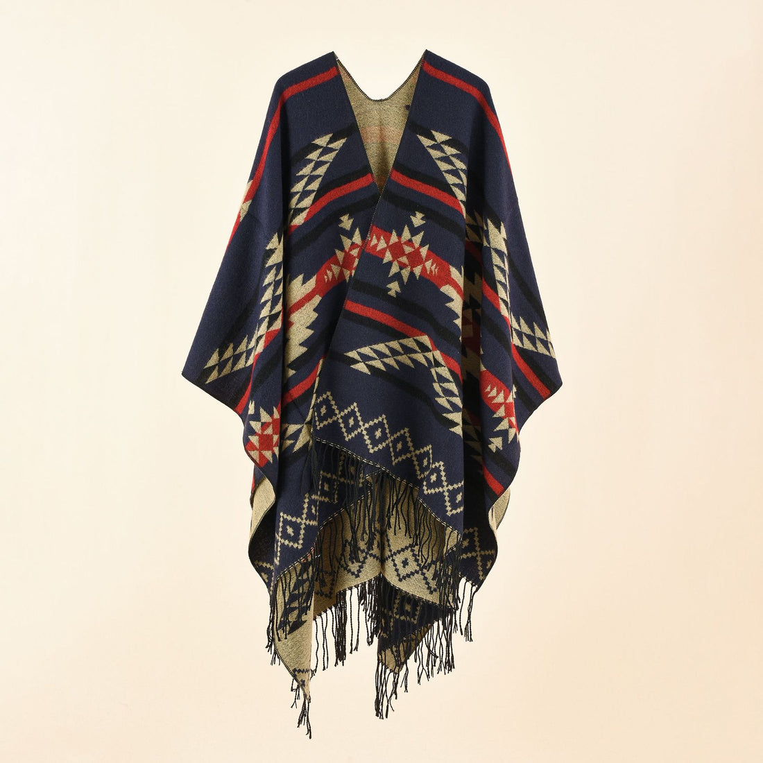Damen Oversize-Ruana im grafischen Jacquard mit kontrastierter Innenseite und Fransensaum – Avérine
