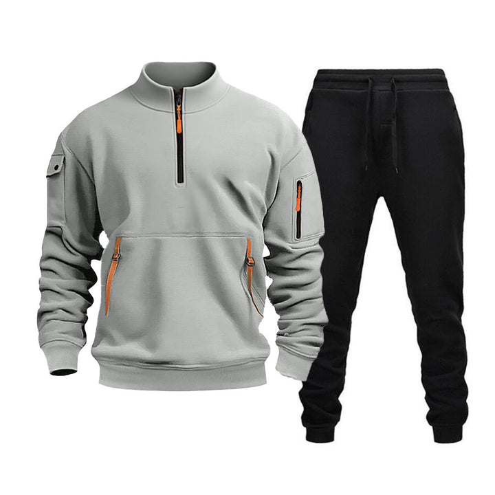 Herren moderner Sportanzug mit funktionalen Taschen und Reißverschlussdetails Echoarchiv