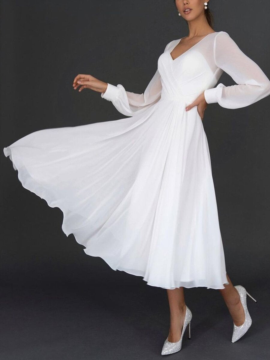 Echoarchiv Damen Midikleid mit Wickeloptik und transparenten Ärmeln