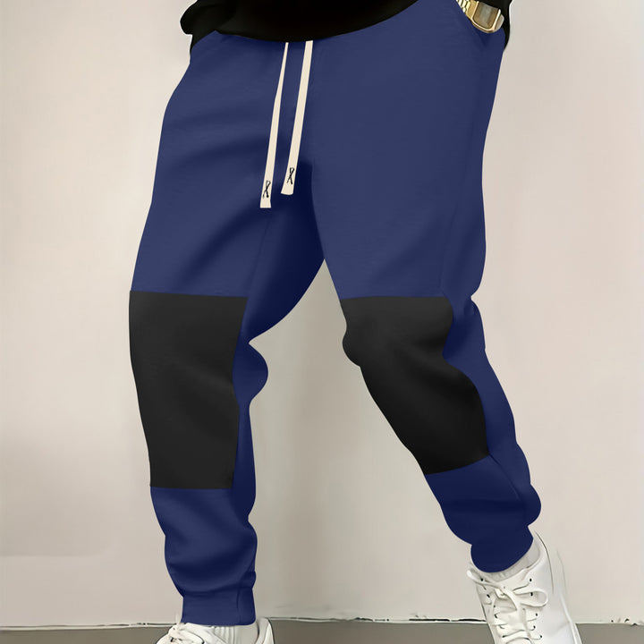 Herren elegante Sporthose mit modernen Farbblockelementen Echoarchiv