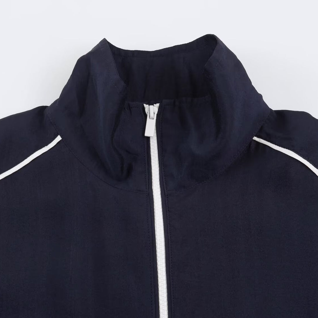 Damen Cropped Windbreaker-Jacke mit hohem Funnelkragen, Kontrastpaspel und elastischem Saum Echoarchiv