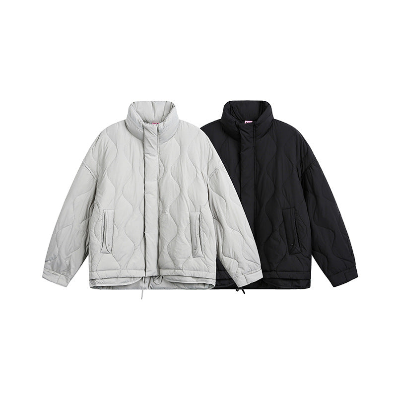 Damen Oversize gesteppte Jacke mit Stehkragen, Wellensteppung und Tunnelzug Echoarchiv