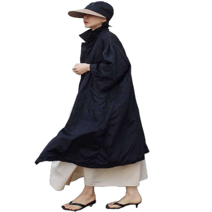 Damen Longline-Parka im leichten Windbreaker-Stil mit innenliegendem Futter, Tunnelzug und Pattentaschen – Célinea