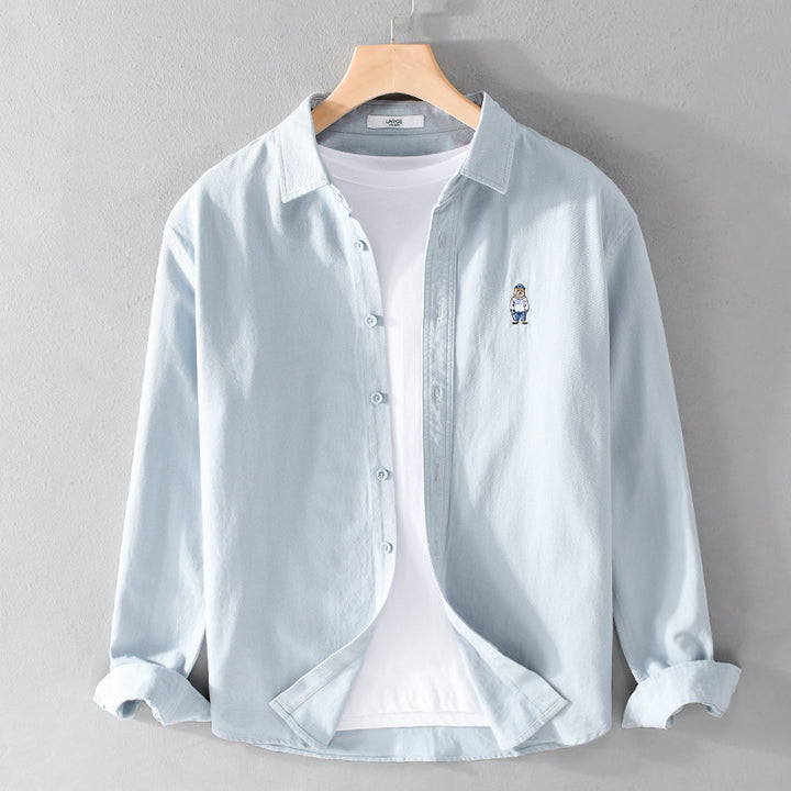 Herren Leichtes Hemd-Overshirt aus Baumwolltwill mit kleiner Figurenstickerei und kastigem Schnitt Echoarchiv