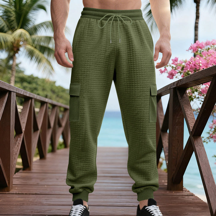 Herren Texturierte Cargo-Jogginghose mit Tunnelzug, aufgesetzten Klappentaschen und gerippten Bündchen – Bravaro