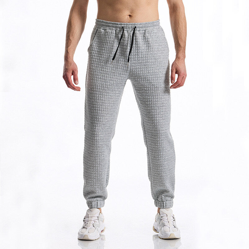 Herren Strukturierte Waffel-Jogginghose mit elastischem Bund und schmal zulaufendem Bein Echo Archiv
