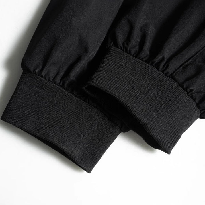 Herren Tech‑Cargo‑Jogger mit taktischen Klappentaschen, verstellbaren Nylonriemen und elastischem Knöchelsaum Echo Archiv