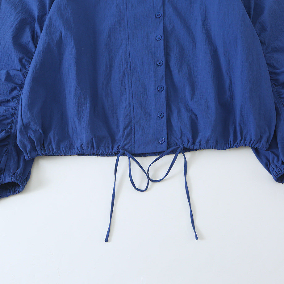 Damen Leichte Cropped Windjacke mit Stehkragen, Raglanärmeln und Tunnelzug Echoarchiv