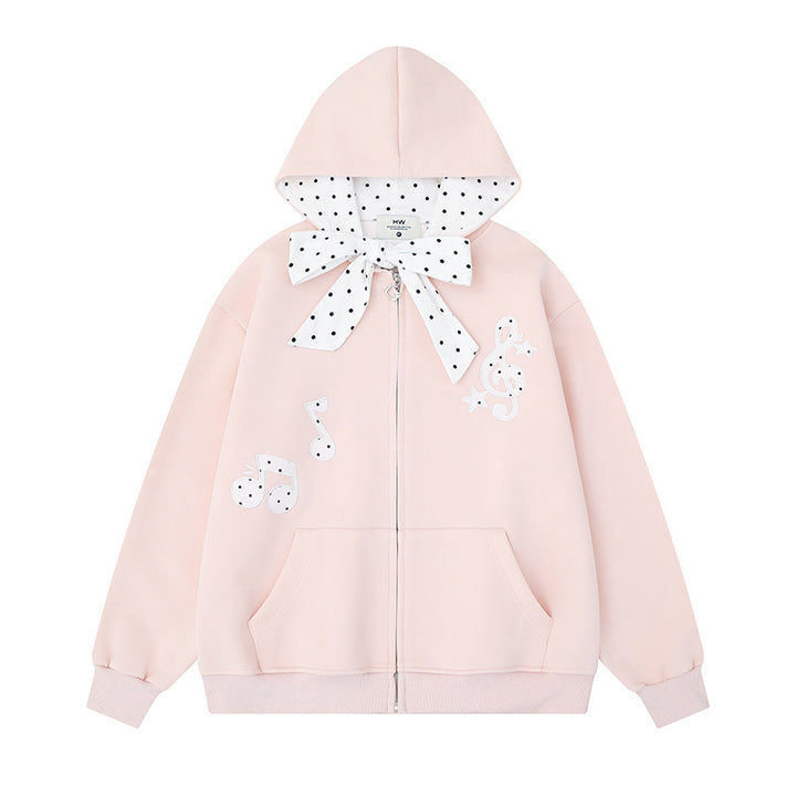 Damen Kapuzensweatjacke mit gepünktetem Kapuzenfutter, dekorativer Schleife und Notenmotiv Echoarchiv