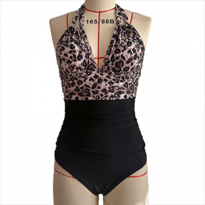 Damen Einteiler Badeanzug mit floralen Cut-Outs und elegantem Wickelrock Echo Archiv