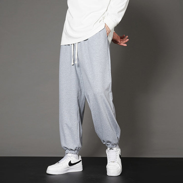 Herren Weite Relax-Jogginghose mit Kordelbund, geradem Beinverlauf & elastischen Bündchen Echoarchiv