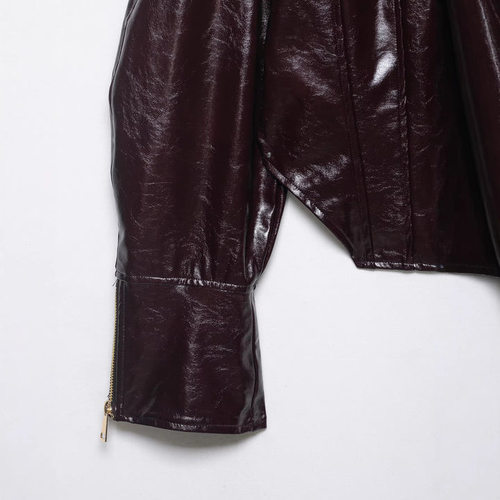 Damen Glänzende Cropped Bikerjacke in Lackoptik mit Schulterklappen und Zip-Ärmeln Echoarchiv