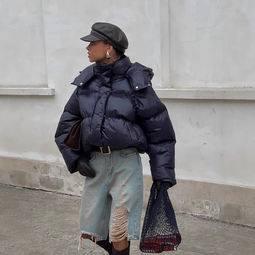 Damen Kurz geschnittene glänzende Oversize-Steppjacke mit hohem Kragen Echoarchiv