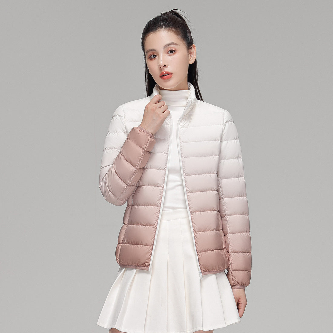 Damen ultraleichte Kapuzen-Steppjacke mit kompaktem Packmaß und windabweisender Hülle Echoarchiv