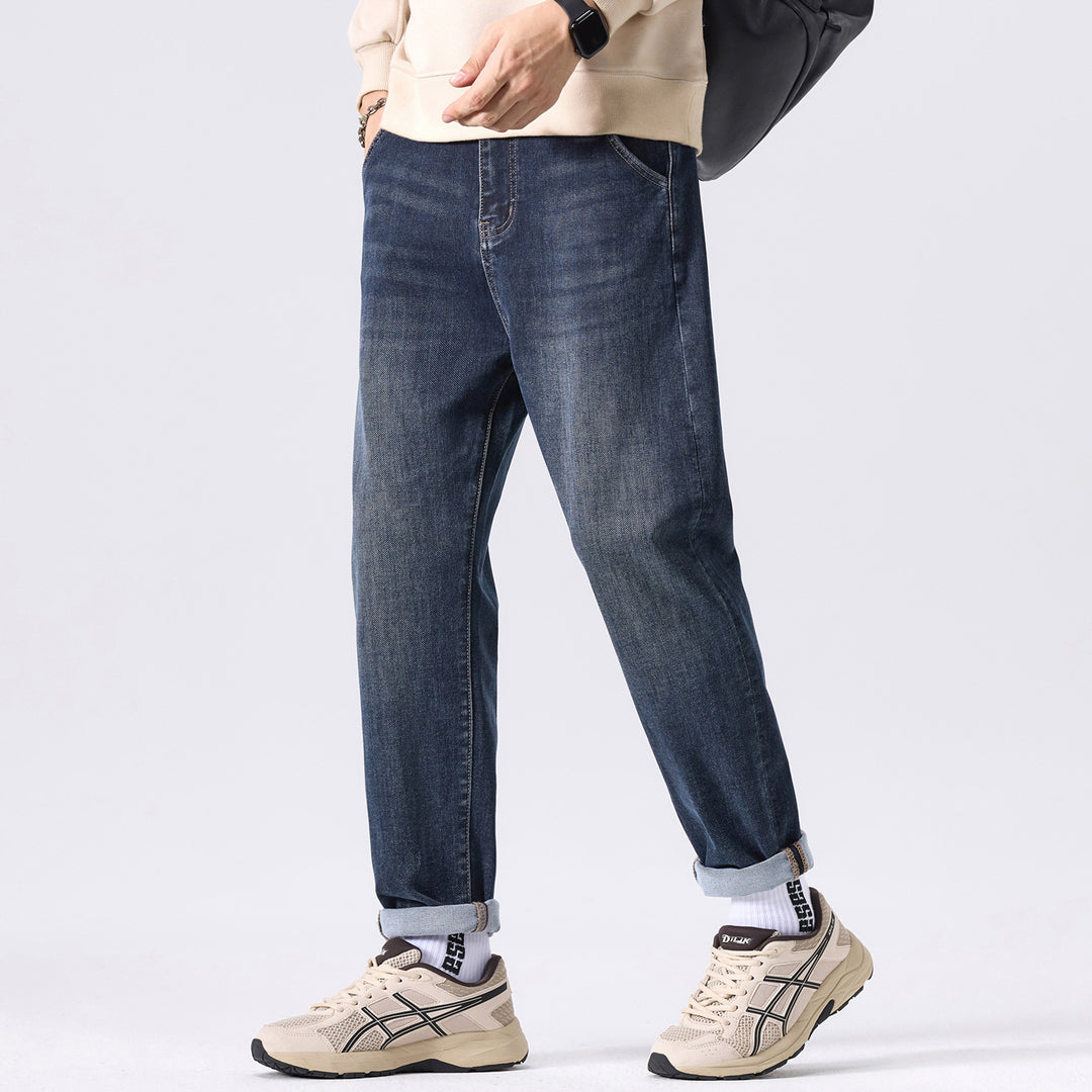 Herren Konisch geschnittene Freizeit-Jeans mit mittlerer Leibhöhe und dezenter Used-Waschung Echoarchiv
