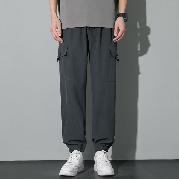 Herren Weite Relaxed-Cargo-Freizeithose mit Tunnelzugbund & Multifunktions‑Taschen Echoarchiv