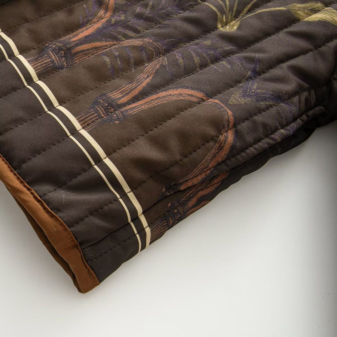 Damen Gepolsterte kurze Steppjacke mit botanischem Print und Kontrastpaspel Echoarchiv