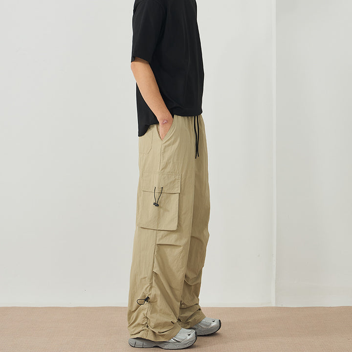 Herren Weite Nylon-Cargohose mit verstellbaren Saumkordeln und Tunnelzugbund Echo Archiv