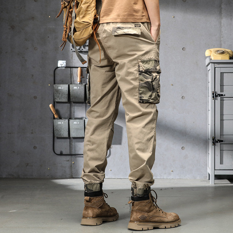 Herren Outdoor‑Cargohose im Joggerstil mit Camouflage‑Kontrast, ergonomischen Knieabnähern und elastischem Komfortbund Echo Archiv
