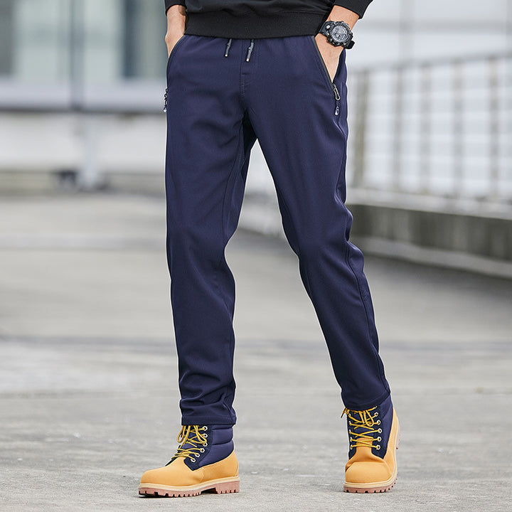 Herren Technische Softshell-Jogginghose mit wasserabweisender Membran, Reißverschlusstaschen und elastischem Kordelbund Echo Archiv