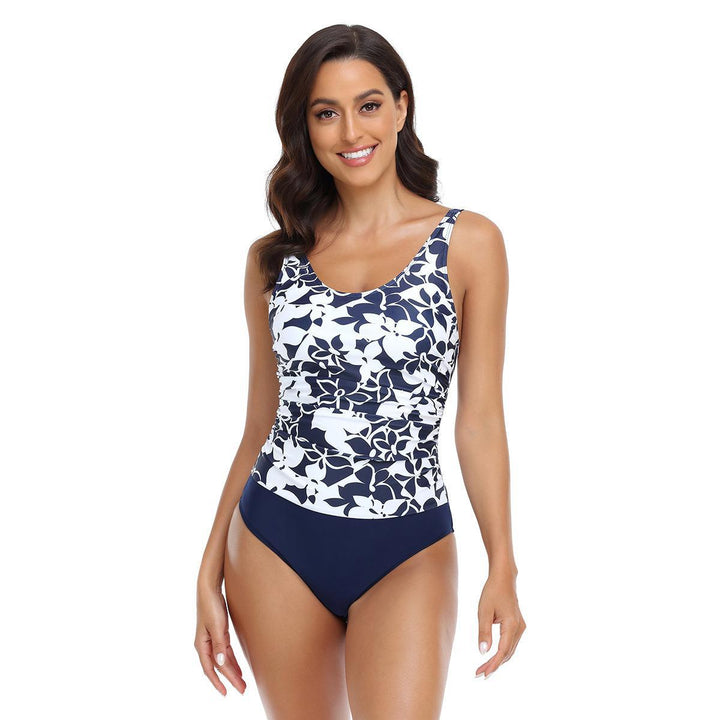 Damen Einteiler Badeanzug mit floralem Design und hohem Bauchweg Echo Archiv