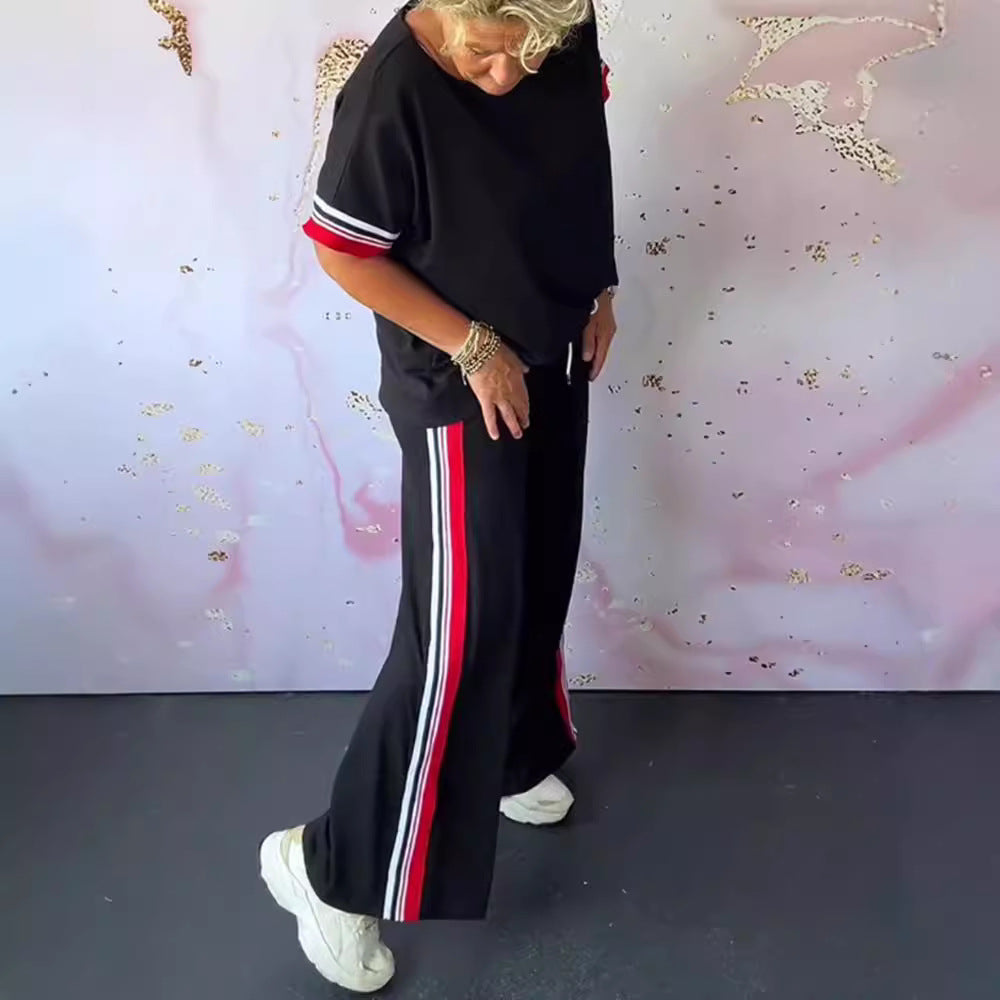 Damen nan sportlich-eleganter Zweiteiler mit kastigem Kurzarmshirt, Tunnelzug-Jogpant und seitlichem Kontraststreifen Echo Archiv