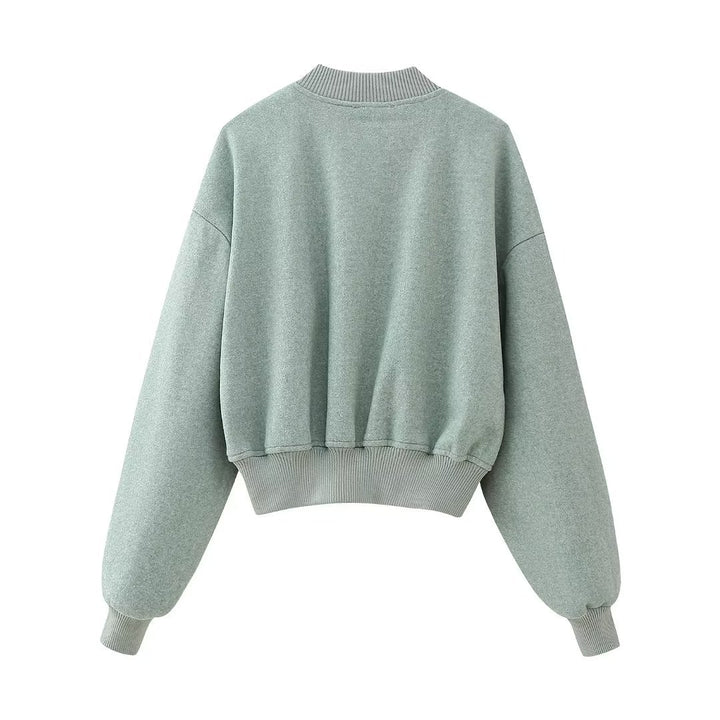 Damen kastiges Cropped Blouson aus Sweat mit Raglanärmeln, verdeckter Druckknopfleiste und breitem Rippbund – Avérine