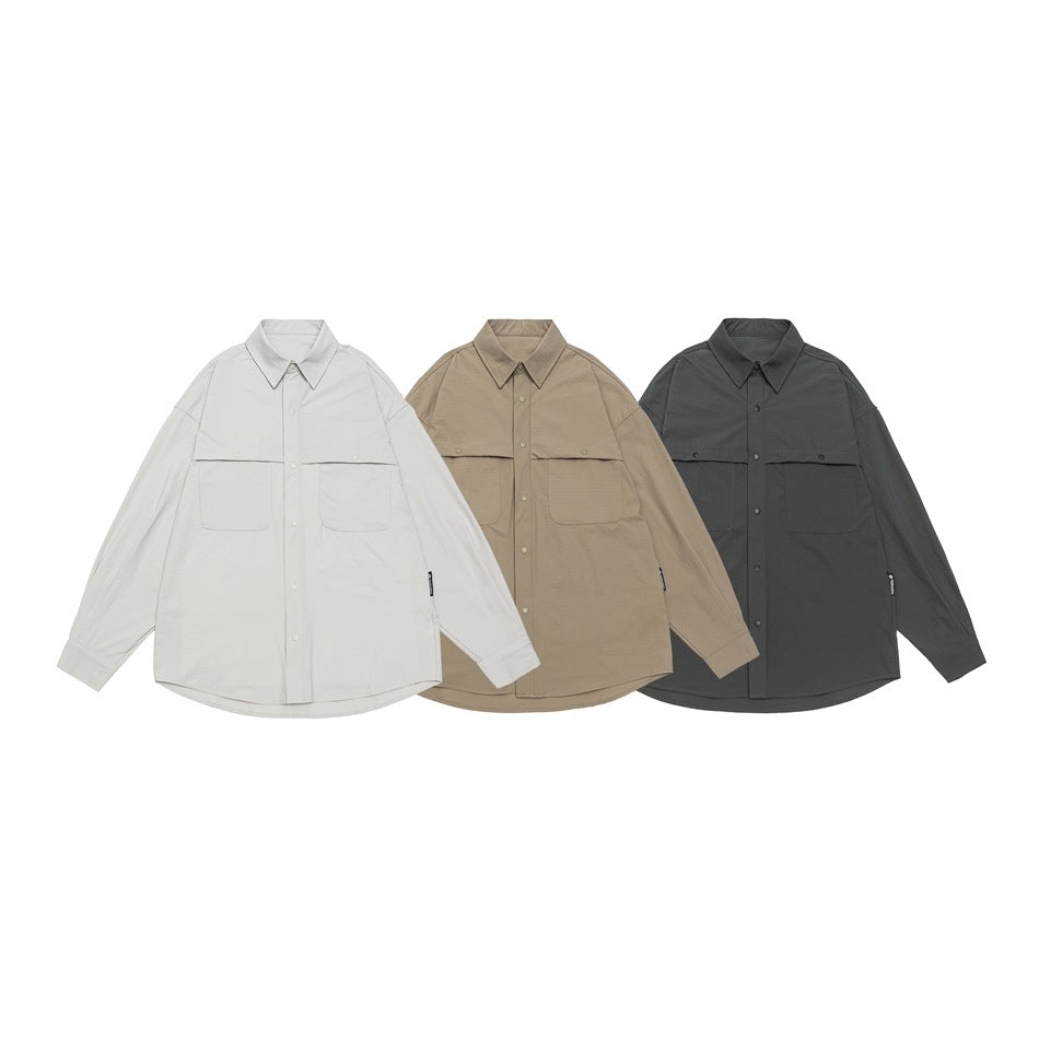 Unisex Weit geschnittene Hemdjacke im Utility‑Stil mit Druckknopfleiste Echoarchiv