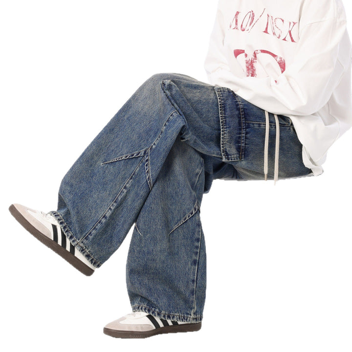 Herren Weite Cargo-Denimhose mit Tunnelzug, Used‑Waschung und Oversize‑Passform Echo Archiv