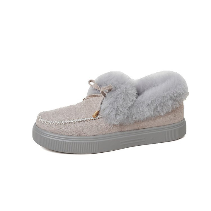 Damen Kuschel‑Mokassin‑Slipper mit hochfloriger Fellmanschette, dekorativer Steppnaht und leichtem Plateau‑Sohlenprofil Echo Archiv