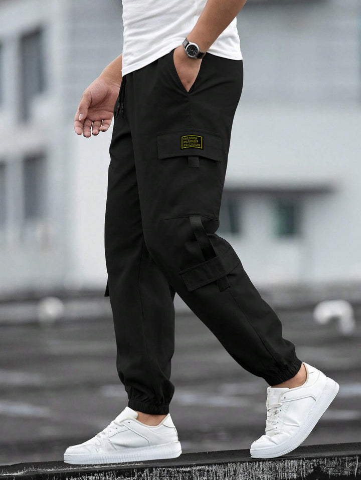 Herren modische Cargo-Joggerhose mit elastischem Bund, Kordelzug und mehreren Sicherheits- und Klappentaschen – Bravaro