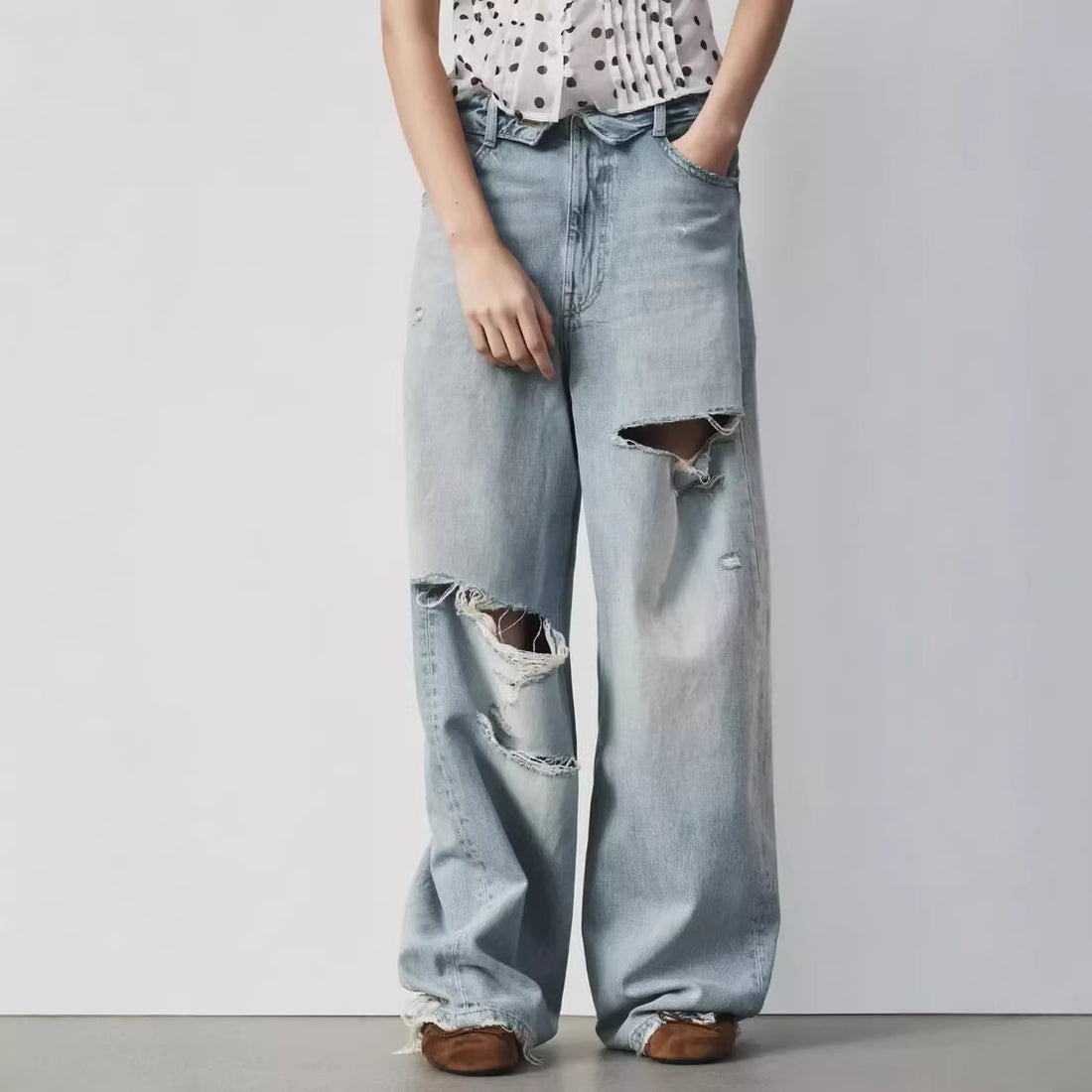 Damen Weite High‑Waist Jeans mit markanter Riss‑ und Used‑Optik Echoarchiv