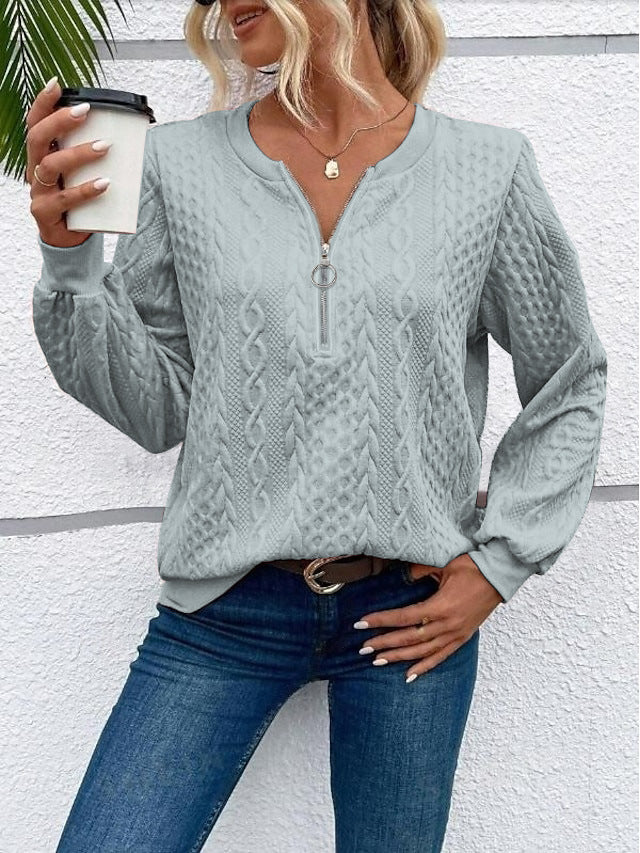 Damen grob strukturiertes Strickpullover mit Kabelmuster, halber Reißverschluss und Ballonärmel Echoarchiv