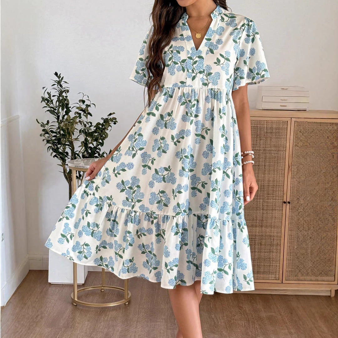 Damen Midikleid mit frischem Blumenmuster und voluminösem Rock Echo Archiv