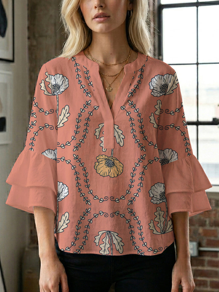 Damen Bluse mit voluminösen Rüschenärmeln und kreativem Floraldesign Echo Archiv