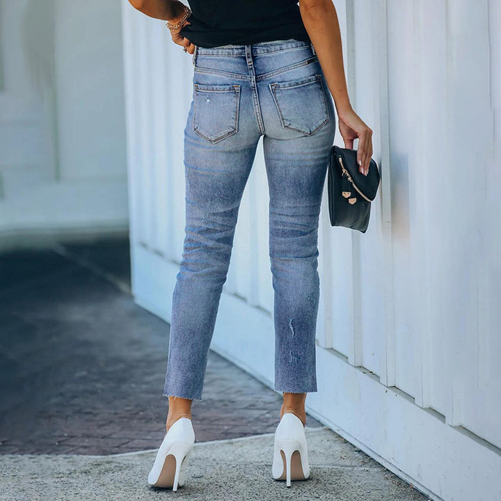 Damen Figurbetonte Hochtaillierte Knöchellange Jeans mit leicht ausgefranstem Saum Echo Archiv