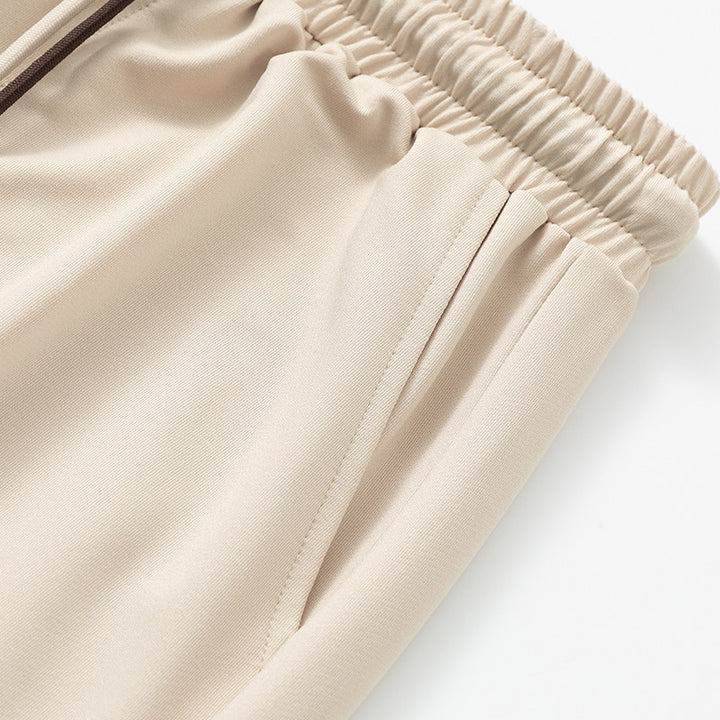 Herren Komfort-Jogginghose mit nachhaltigem Interlock-Stretch, verdeckten Eingrifftaschen & elastischen Knöchelbündchen Echo Archiv